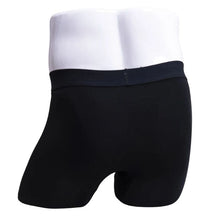 body of male mannequin wearing boxer 2.0 black boxer brief undershorts front view on white background