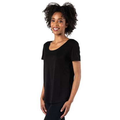 female model wearing black brenda u-neck tee side view on white background