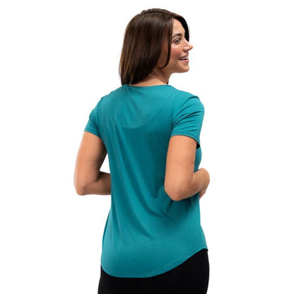 female model wearing coastal teal green brenda u-neck tee back view on white background