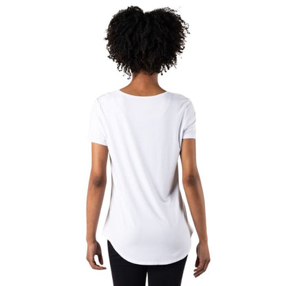 top of female model wearing white brenda u-neck tee back view on white bacground