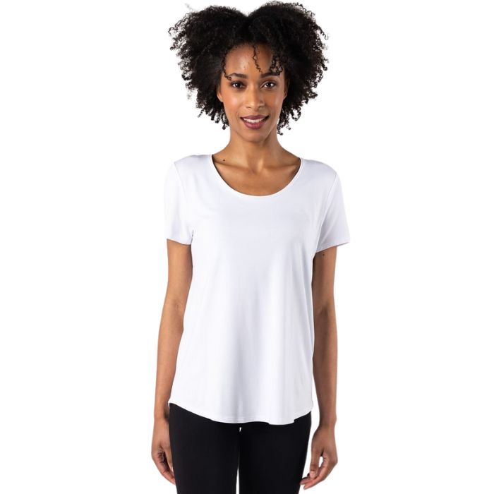 top of female model wearing white brenda u-neck tee front view on white bacground