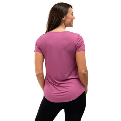 female model wearing wild rose pink brenda u-neck tee back view on white background