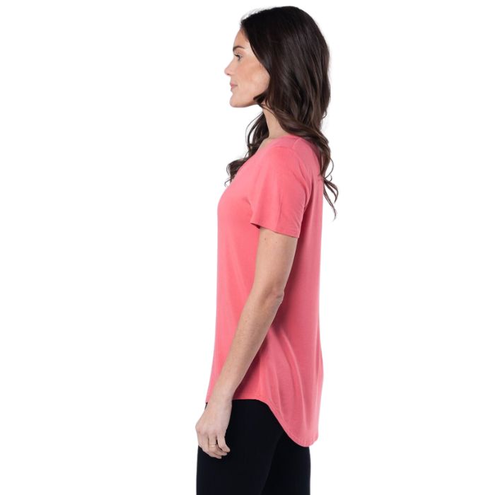 female model wearing coral pink brenda u-neck tee side view on white background
