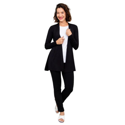 female model wearing black chopra jacket, white reanna tank top and black nadia pants front view on white background