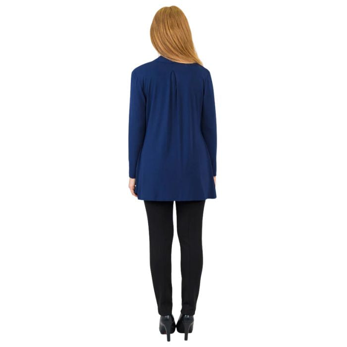 female model wearing indigo blue chopra jacket, white reanna tank top and black nadia pants back view on white background