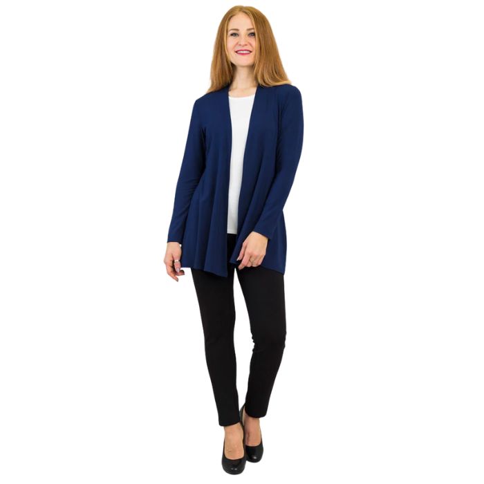 female model wearing indigo blue chopra jacket, white reanna tank top and black nadia pants front view on white background