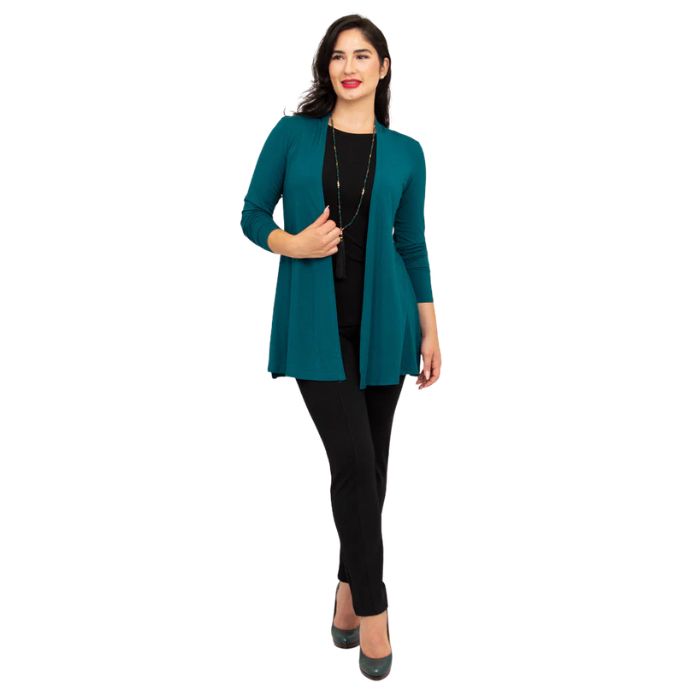female model wearing teal green chopra jacket, black reanna tank top and black nadia pants front view on white background