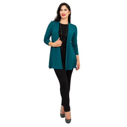 female model wearing teal green chopra jacket, black reanna tank top and black nadia pants front view on white background