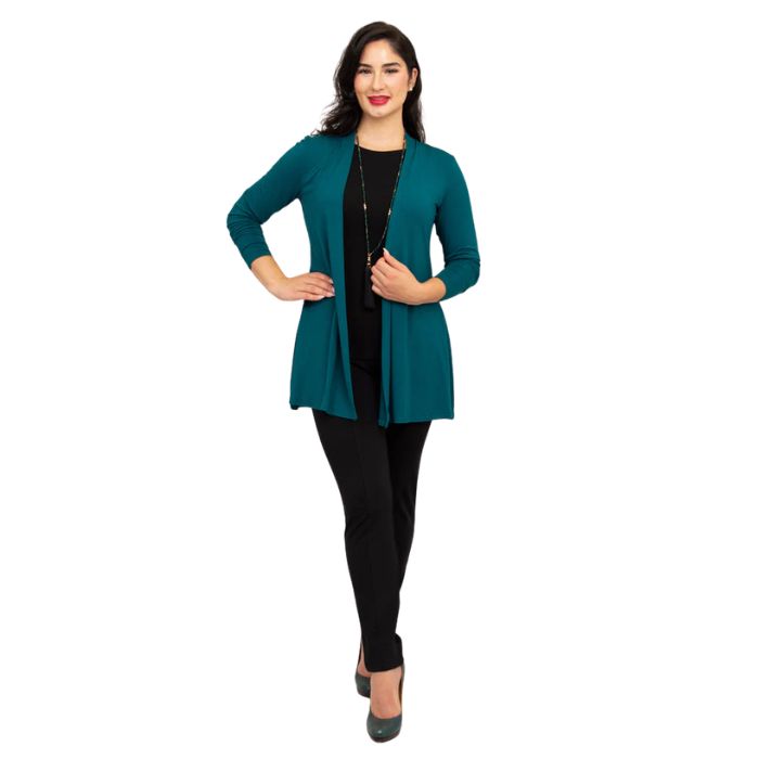 female model wearing teal green chopra jacket, black reanna tank top and black nadia pants front view on white background