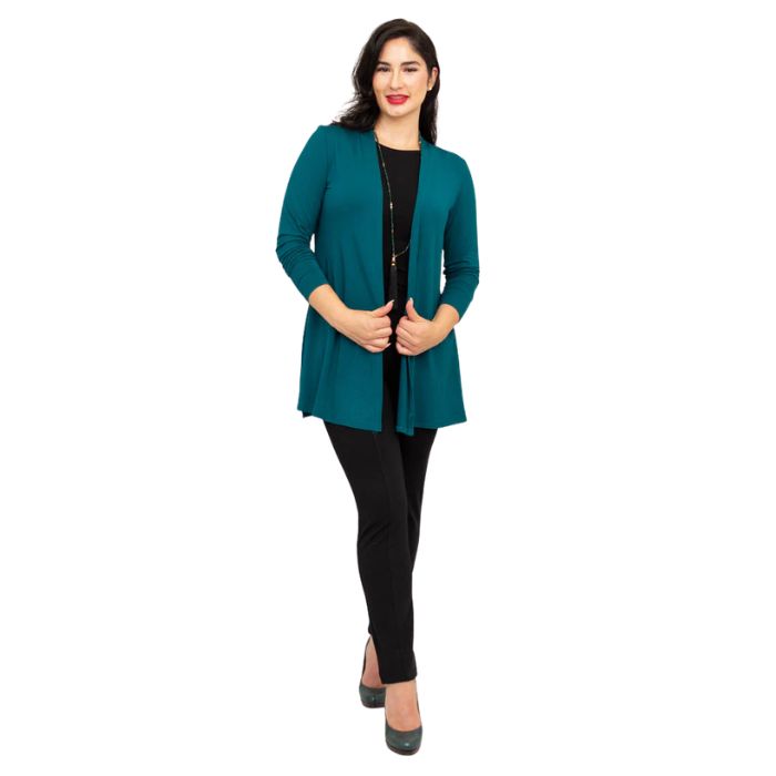 female model wearing teal green chopra jacket, black reanna tank top and black nadia pants front view on white background