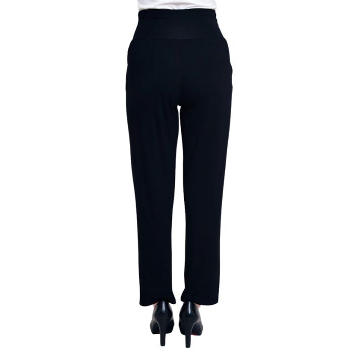 bottom of female model wearing black clair pants back view on white background