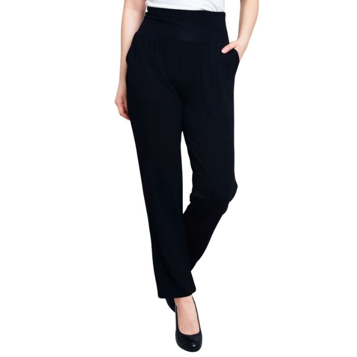 bottom of female model wearing black clair pants front view on white background