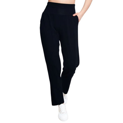 bottom of female model wearing black clair pants front view on white background