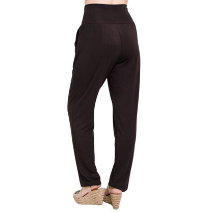 female model wearing coffee brown clair pants waist down back view on white background