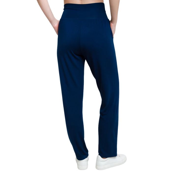 bottom of female model wearing indigo blue clair pants back view on white background