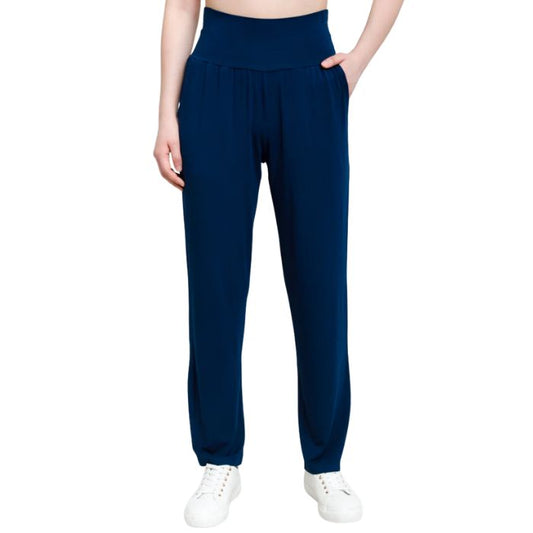 bottom of female model wearing indigo blue clair pants front view on white background