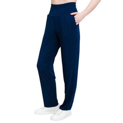 bottom of female model wearing indigo blue clair pants front view on white background