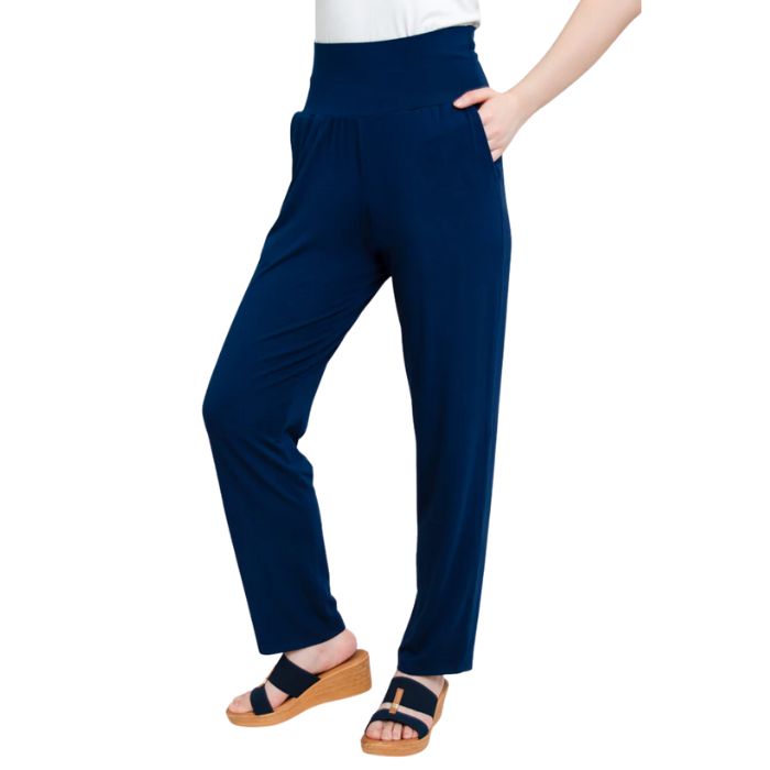 bottom of female model wearing indigo blue clair pants front view on white background