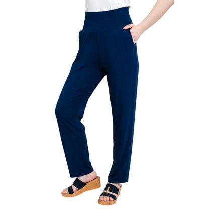 bottom of female model wearing indigo blue clair pants front view on white background