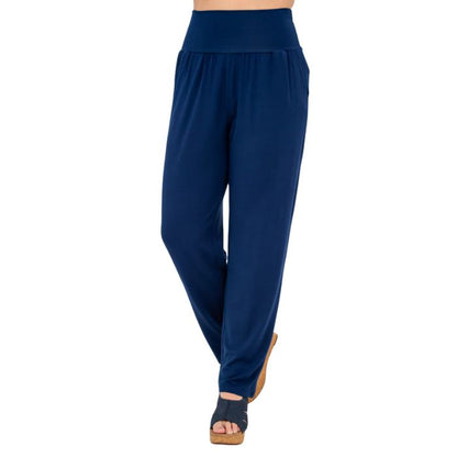 bottom of female model wearing indigo blue clair petite pants front view on white background