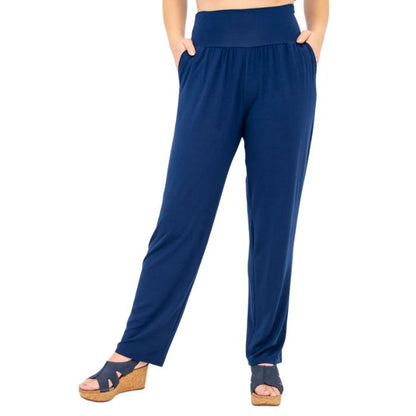 bottom of female model wearing indigo blue clair petite pants front view on white background