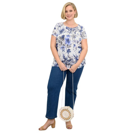 female model wearing peri palm print clara top and denim blue straight leg jaens front view on white background