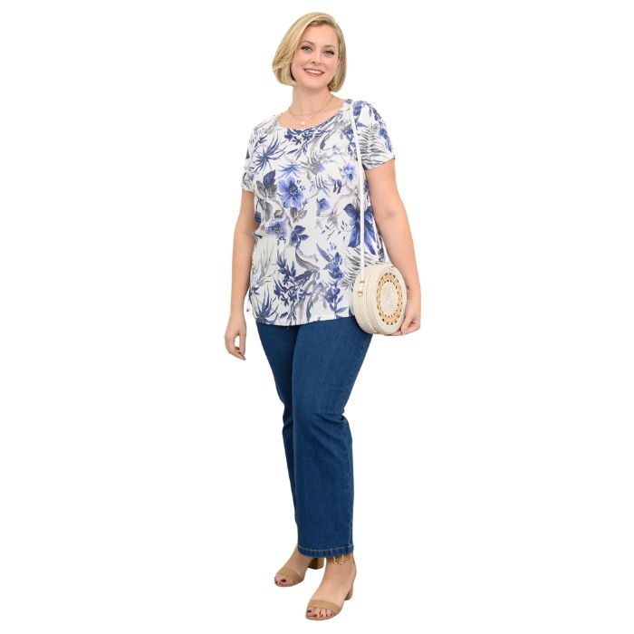 female model wearing peri palm print clara top and denim blue straight leg jaens front view on white background