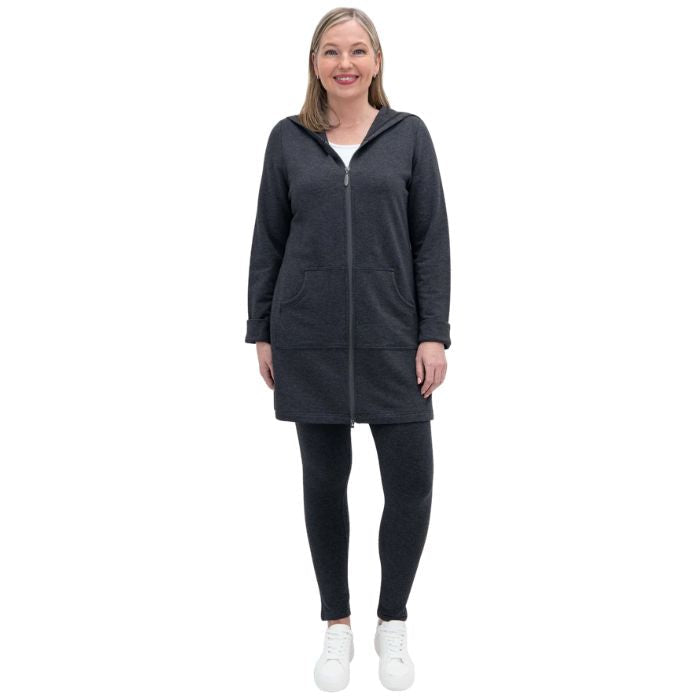 a woman wearing graphite grey cortes jacket and black dixie fleece leggings front view set on a studio white background