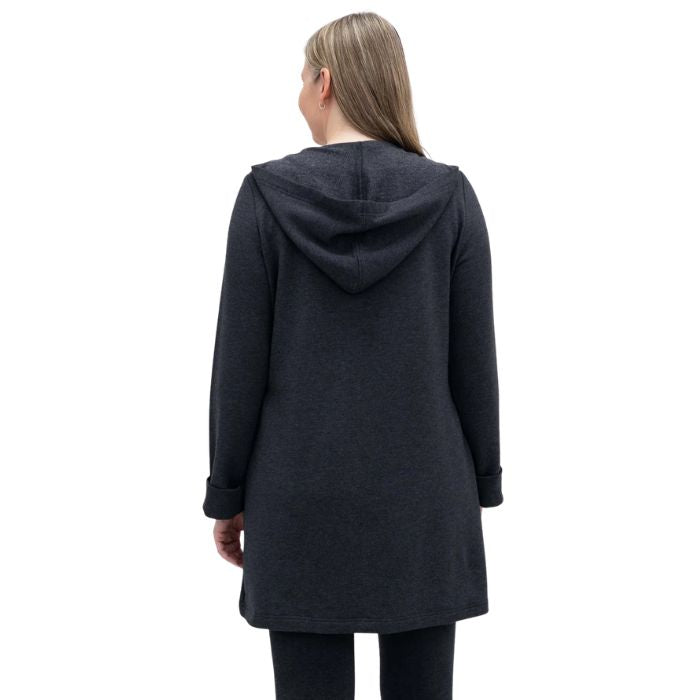 a woman wearing graphite grey cortes jacket waist up back view set on a studio white background