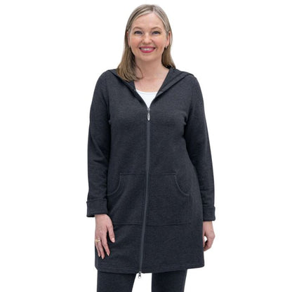 a woman wearing graphite grey cortes jacket waist up front view set on a studio white background