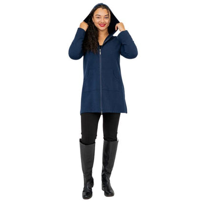 a woman wearing indigo blue cortes jacket and black dixie fleece leggings  front view set on a studio white background