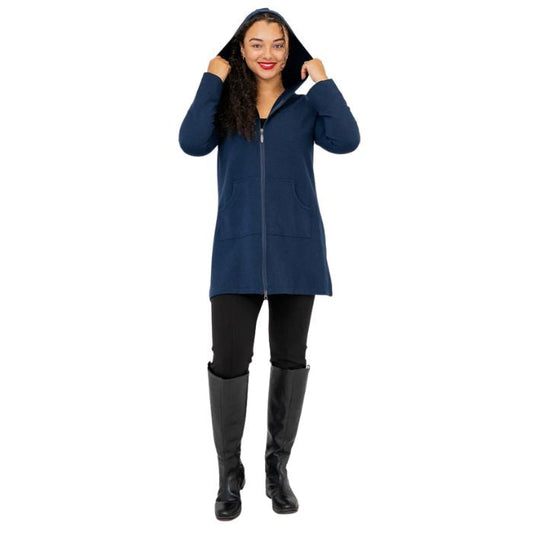 a woman wearing indigo blue cortes jacket and black dixie fleece leggings  front view set on a studio white background