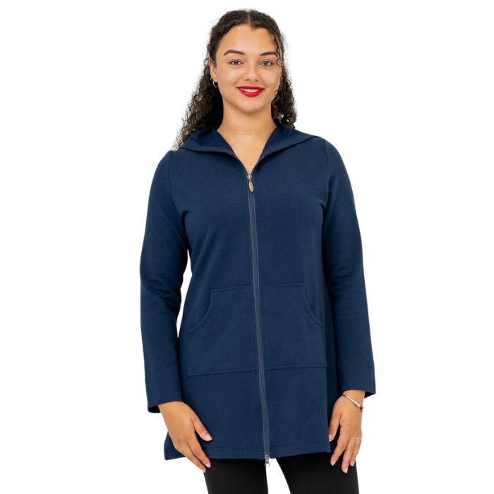 a woman wearing indigo blue cortes jacket waist up front view set on a studio white background