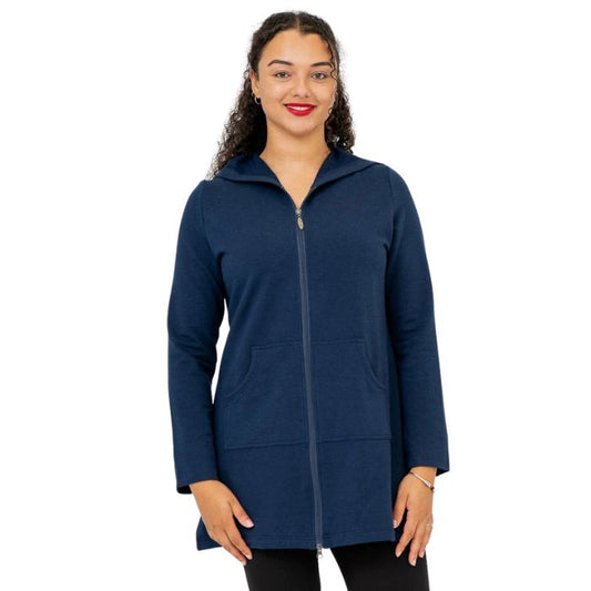 a woman wearing indigo blue cortes jacket waist up front view set on a studio white background