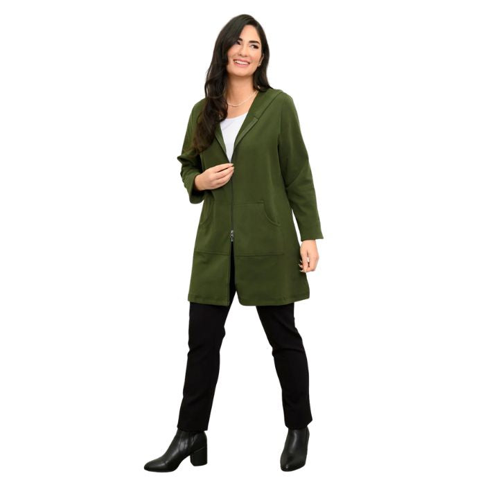 a woman wearing kombu green cortes jacket, white jazz tank top and black nadia pants front view set on a studio white background