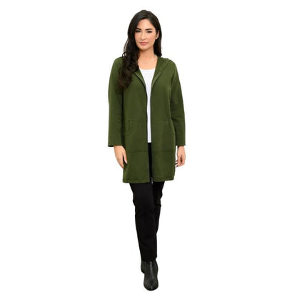 a woman wearing kombu green cortes jacket, white jazz tank top and black nadia pants front view set on a studio white background