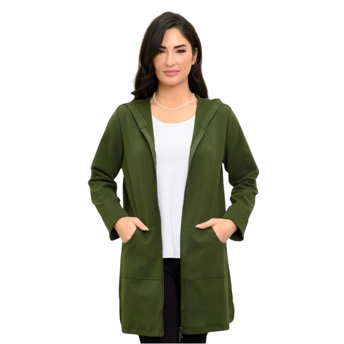 a woman wearing kombu green cortes jacket and white jazz tank top waist up front view set on a studio white background