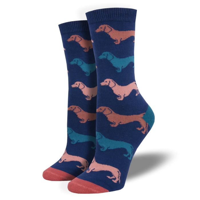 Dachshund socks a pair of blue crew socks with colorful dachshund dog print on white background