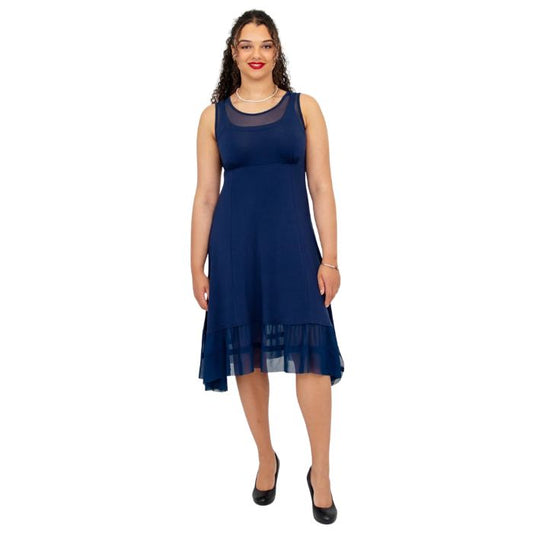 woman wearing indigo blue danube dress front view set on a white background