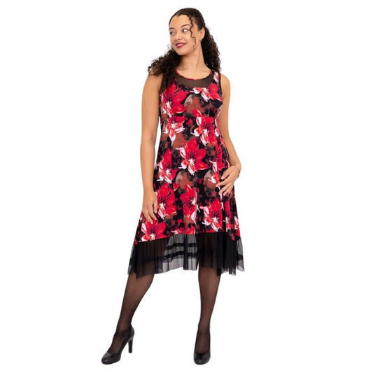 woman wearing lipstick poinsetta print danube dress front view set on a white background