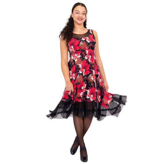 woman wearing lipstick poinsetta print danube dress front view set on a white background