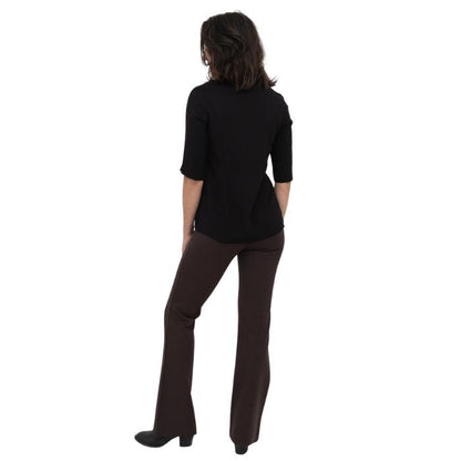 female model wearing coffee brown daya pants and black lorrine blouse back view on white background