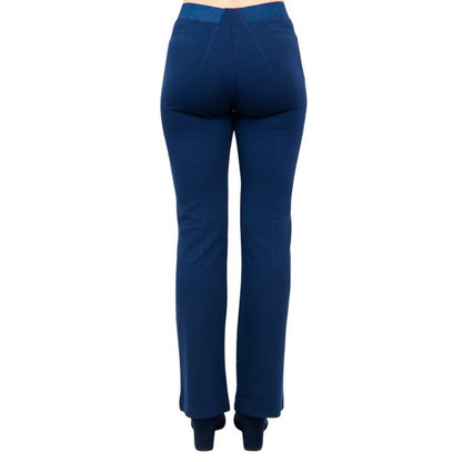 female model wearing indigo blue daya petite pants waist down back view on white background
