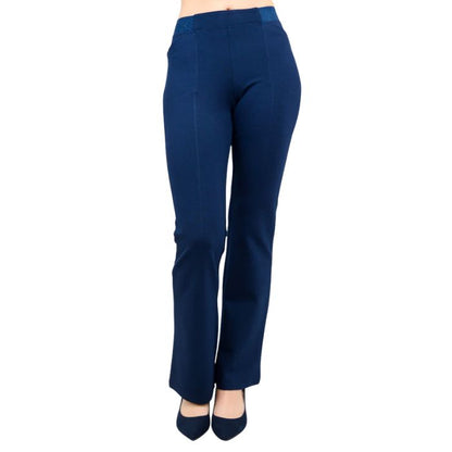female model wearing indigo blue daya petite pants waist down front view on white background