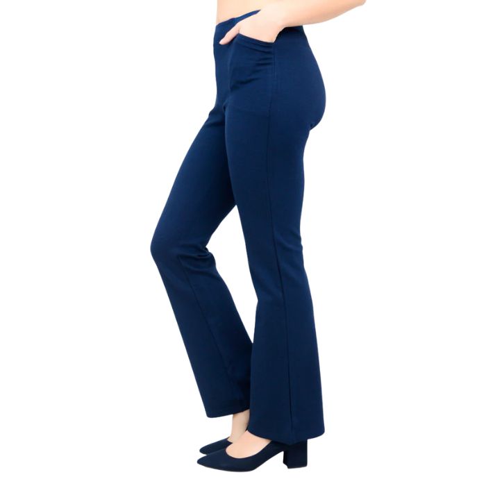 female model wearing indigo blue daya petite pants waist down side view on white background