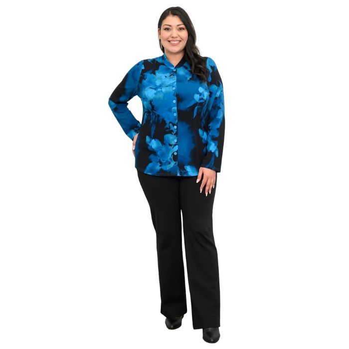 a woman wearing blue space print debbie blouse and black daya pants front view set on a studio white background