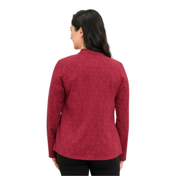 a woman wearing crimson empire print debbie blouse waist up back view set on a studio white background