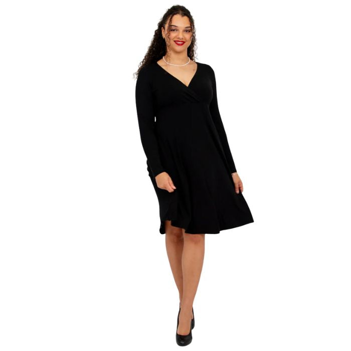 female model wearing black denver dress front view on white background