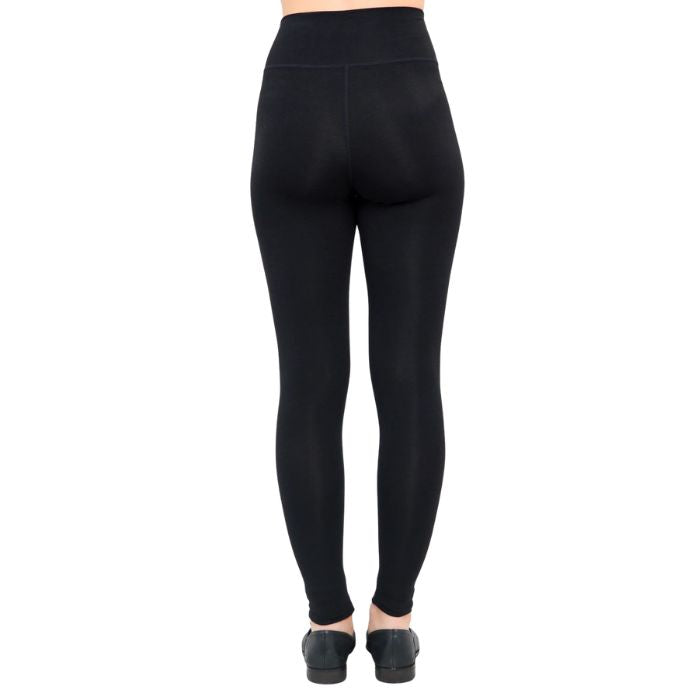 bottom of female model wearing dixie black fleece leggings back view on white background