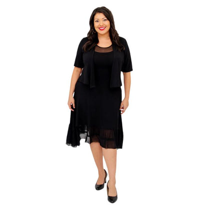 female model wearing black doda jacket and black danube dress front view on white background